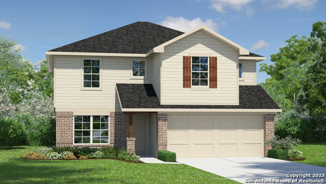 167 American Robin Way San Antonio, TX 78253 - Photo 1 of 40 a front view of a house with a yard and garage