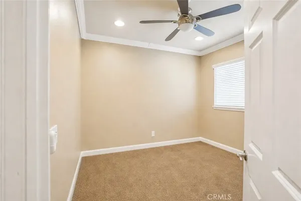 a bathroom with a toilet a sink and shower