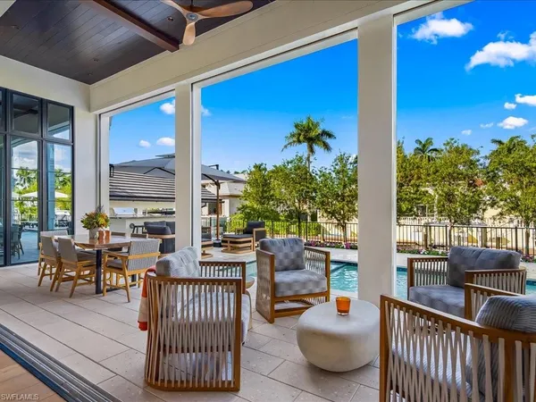 a outdoor space with patio furniture and potted plants