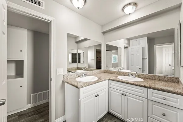 a bathroom with a bathtub and a toilet