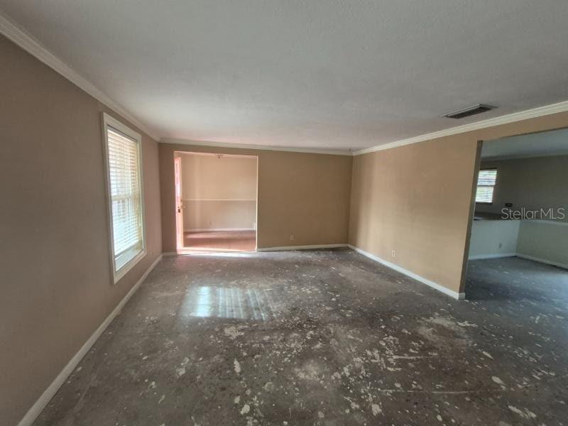 1702 Ketch Place Brandon, FL 33511 - Photo 3 of 14 a view of an empty room with a window