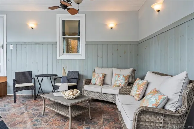 a workspace with furniture and a wooden floor