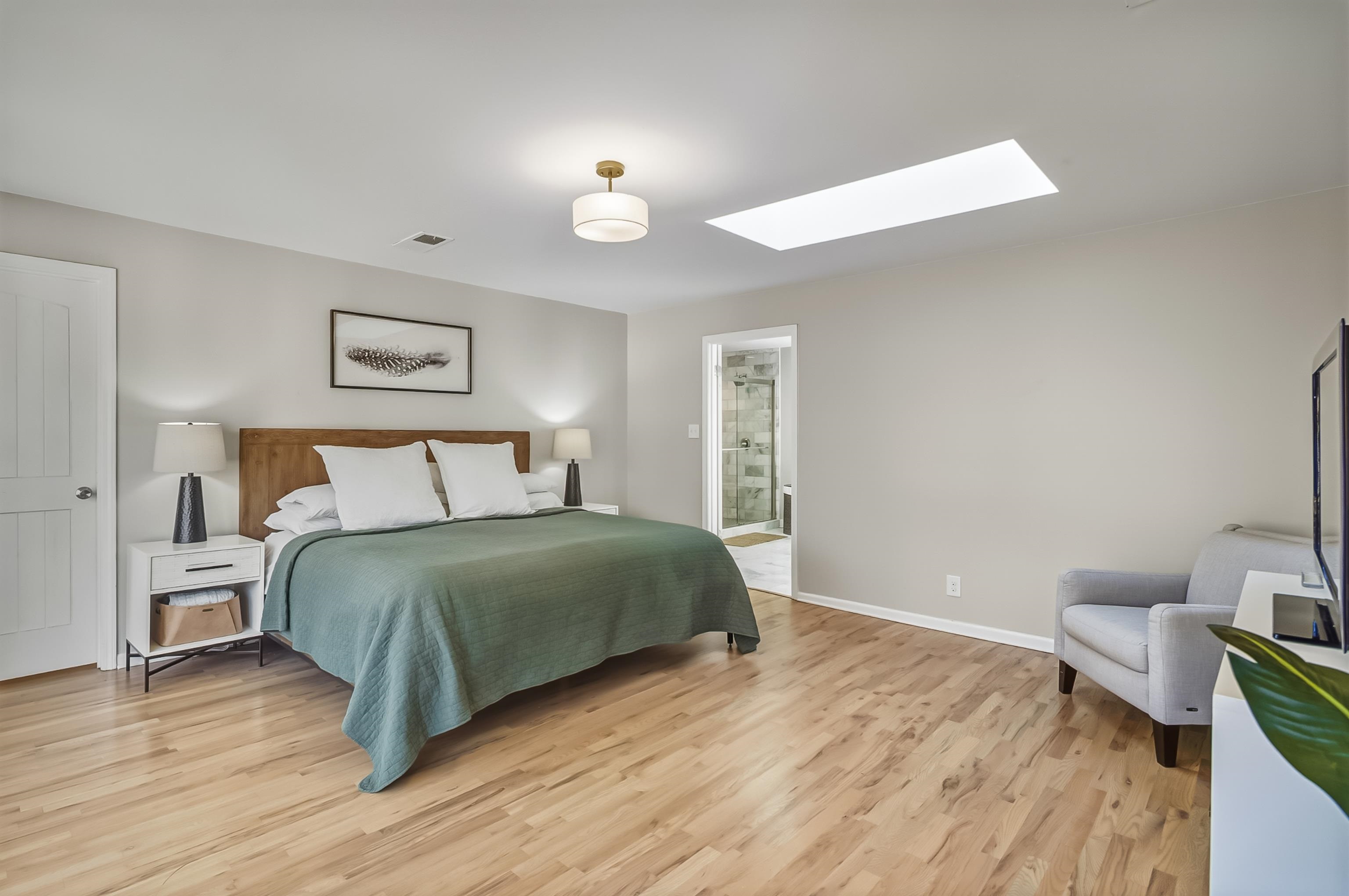5155 Shady Grove Road Memphis, TN 38117 - Photo 20 of 40 Bedroom with a skylight and light wood-style flooring