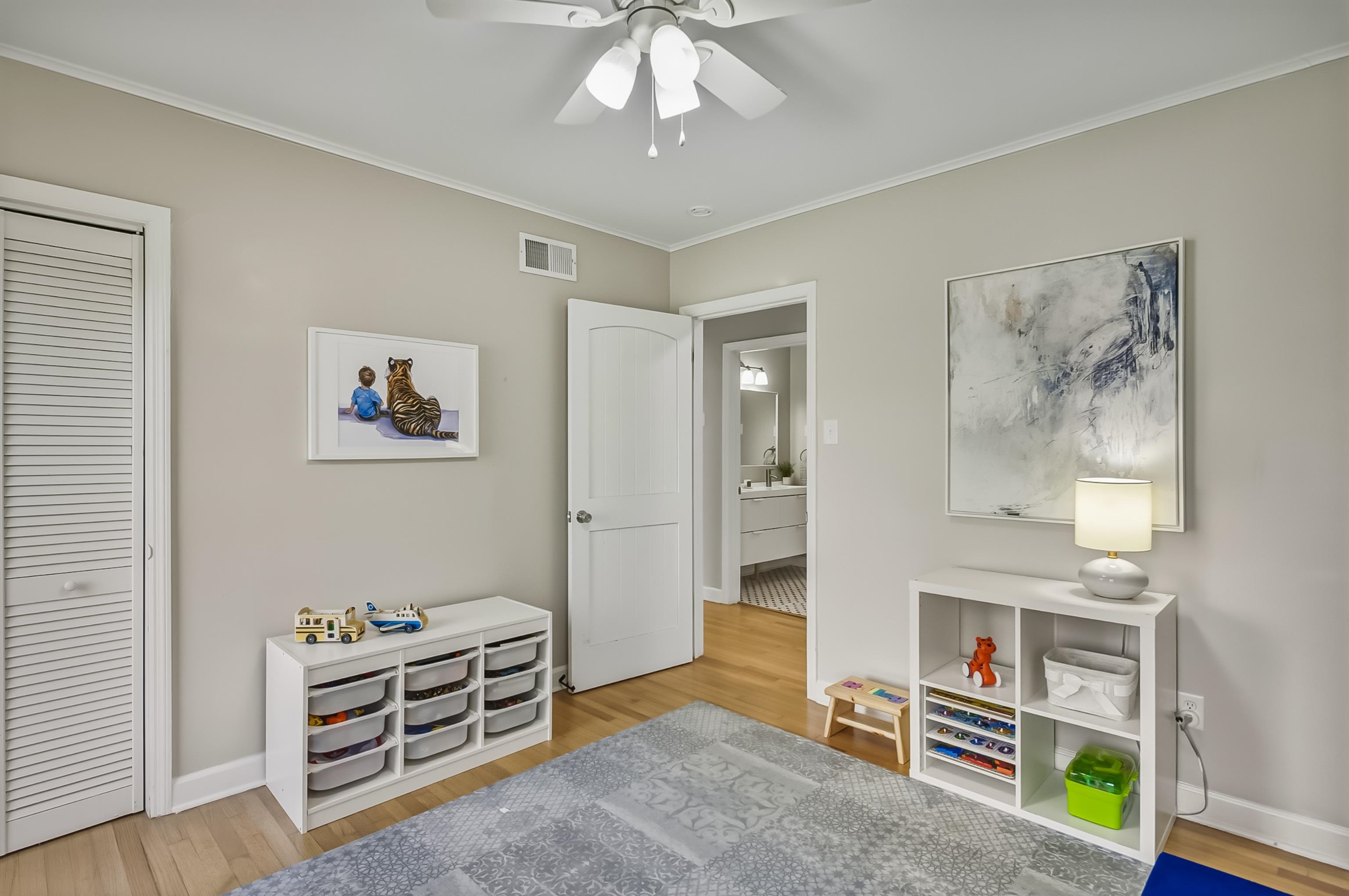 5155 Shady Grove Road Memphis, TN 38117 - Photo 28 of 40 Rec room with ornamental molding, a ceiling fan, and light wood-type flooring