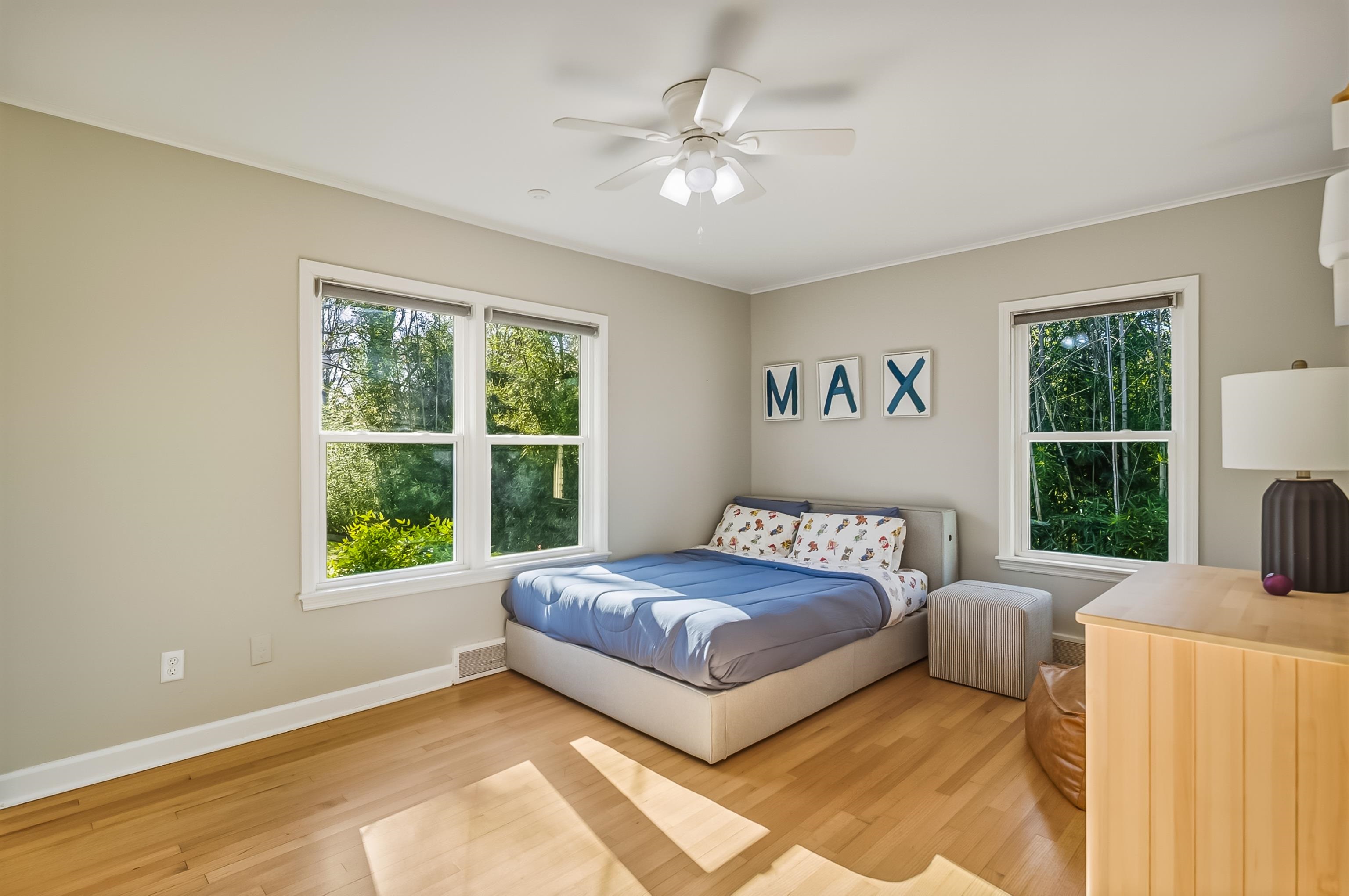 5155 Shady Grove Road Memphis, TN 38117 - Photo 32 of 40 Bedroom featuring light wood finished floors and a ceiling fan