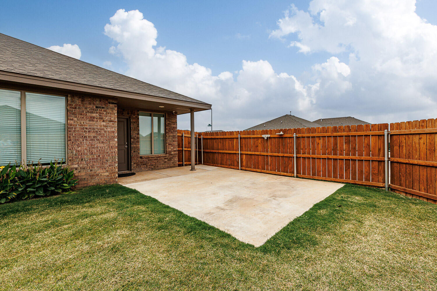 6956 12th Street Lubbock, TX 79416 - Photo 38 of 43 a view of a backyard of the house
