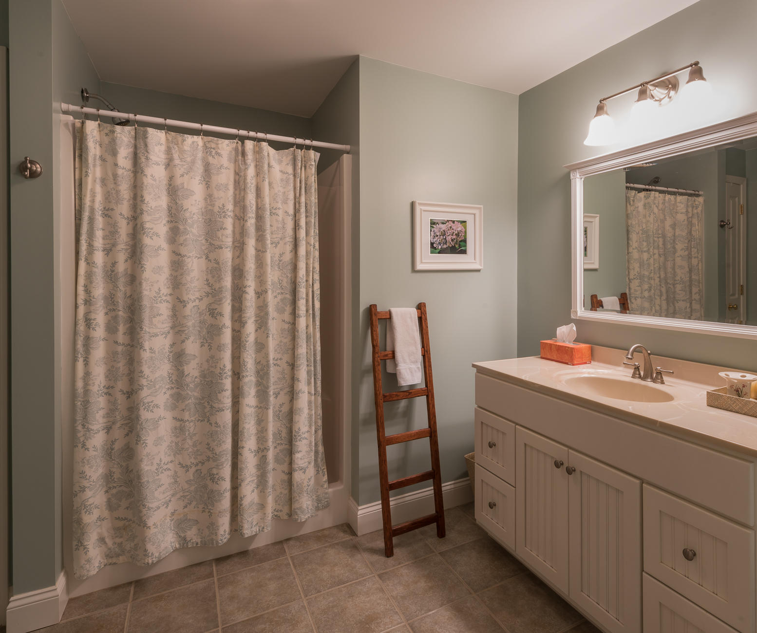62 Sea Robin Road Osterville, MA 02655 - Photo 16 of 30 a bathroom with a double vanity sink and mirror