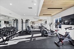 635 Main Street, Unit 211 Wilmington, MA 01887 - Photo 13 of 18 a view of a room with gym equipment