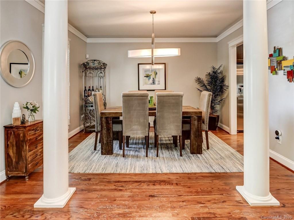 3384 Richard's Crossing Fort Mill, SC 29708 - Photo 12 of 48 a view of a dining room with furniture and wooden floor