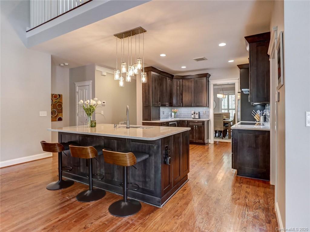 3384 Richard's Crossing Fort Mill, SC 29708 - Photo 15 of 48 a large kitchen with a table and chairs