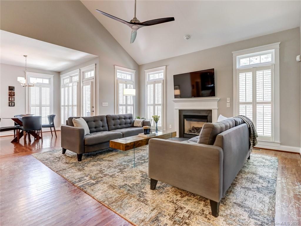 3384 Richard's Crossing Fort Mill, SC 29708 - Photo 20 of 48 a living room with furniture a flat screen tv and a fireplace