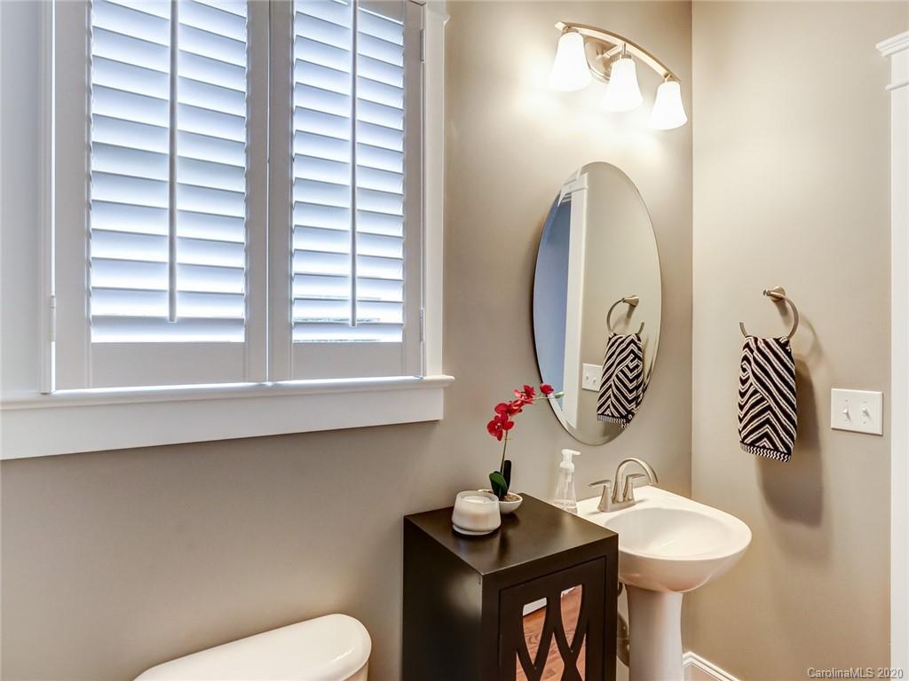 3384 Richard's Crossing Fort Mill, SC 29708 - Photo 26 of 48 a bathroom with a toilet sink and mirror