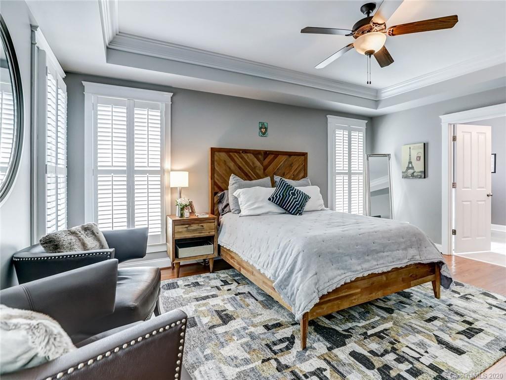 3384 Richard's Crossing Fort Mill, SC 29708 - Photo 28 of 48 a bedroom with a bed and wooden floor