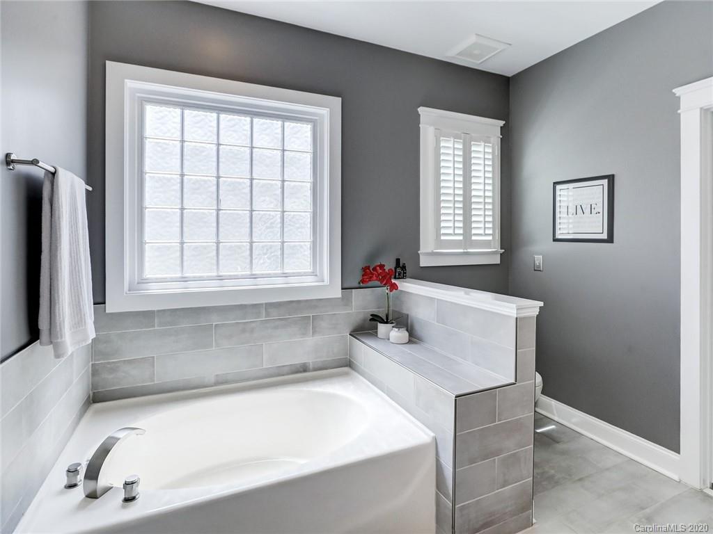 3384 Richard's Crossing Fort Mill, SC 29708 - Photo 31 of 48 a bath tub sitting in a bathroom next to a window