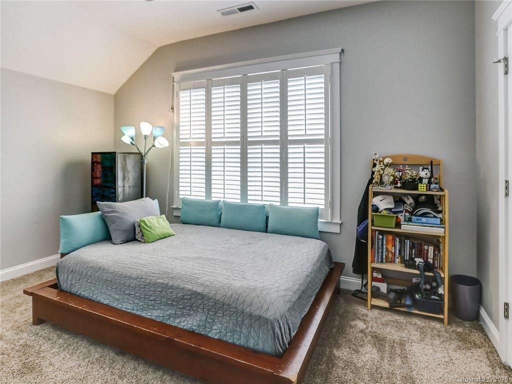 3384 Richard's Crossing Fort Mill, SC 29708 - Photo 32 of 48 a bedroom with a bed and a window