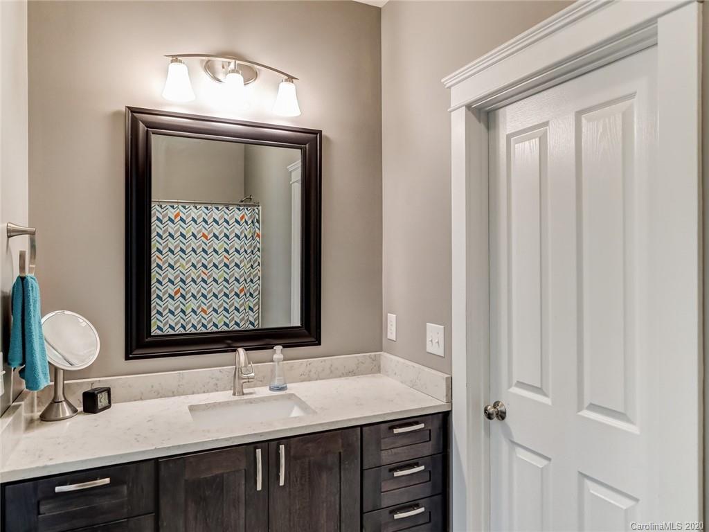 3384 Richard's Crossing Fort Mill, SC 29708 - Photo 34 of 48 a bathroom with a double vanity sink and a mirror