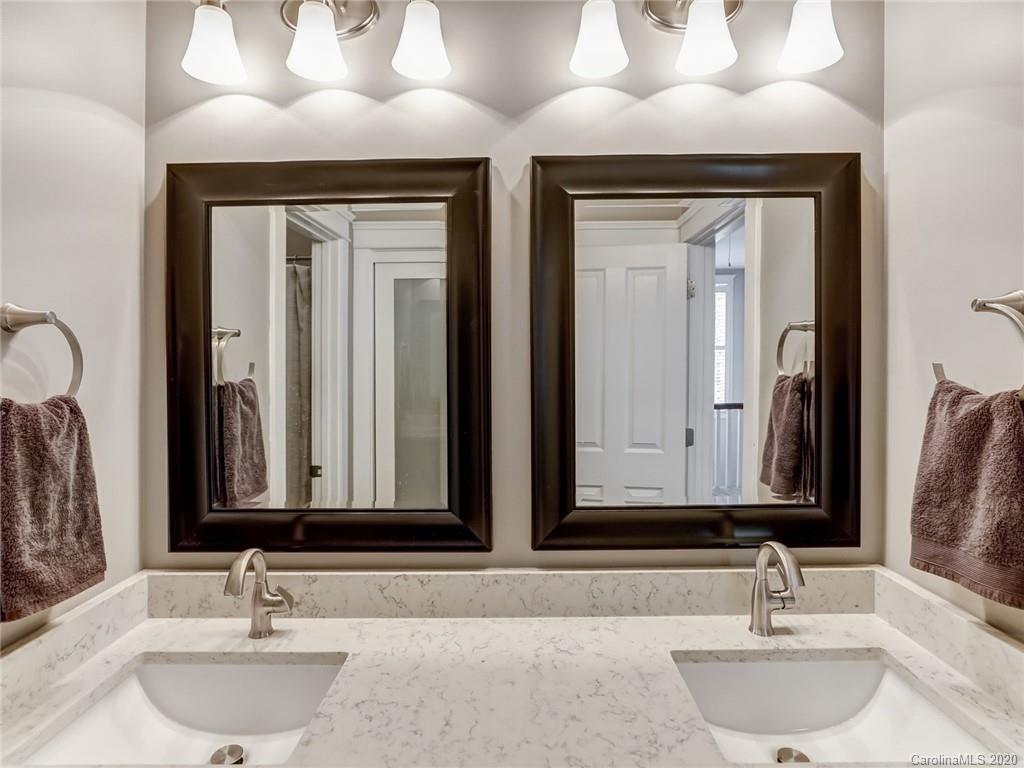 3384 Richard's Crossing Fort Mill, SC 29708 - Photo 38 of 48 a bathroom with double vanity sinks and a mirror