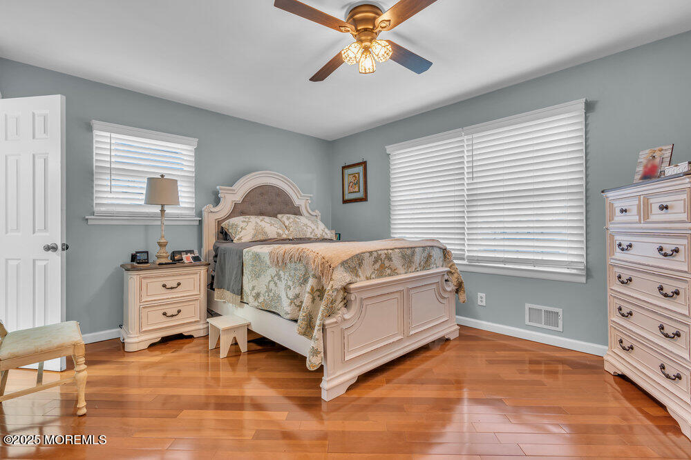6 Coral Drive Hazlet, NJ 07730 - Photo 13 of 23 a bedroom with a bed and a dresser