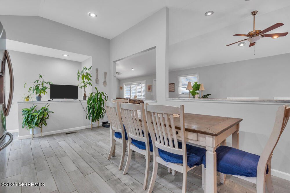 6 Coral Drive Hazlet, NJ 07730 - Photo 9 of 23 a view of a dining room with furniture and wooden floor