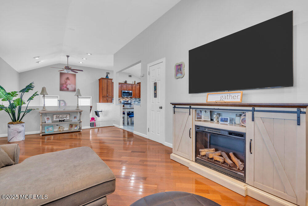 6 Coral Drive Hazlet, NJ 07730 - Photo 10 of 23 a living room with furniture and a flat screen tv