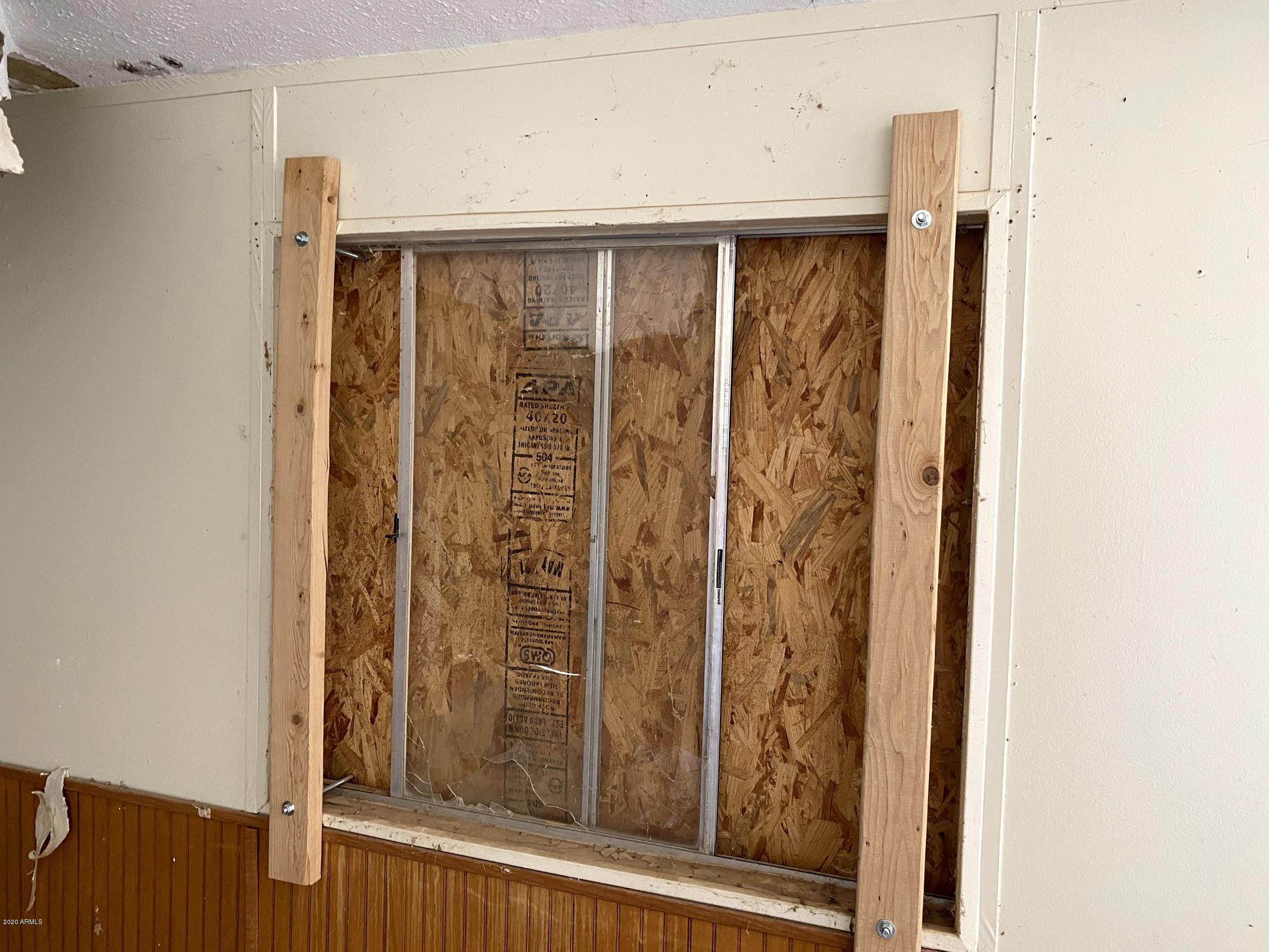 11337 Coloma Road Arizona City, AZ 85123 - Photo 10 of 13 Boarded windows