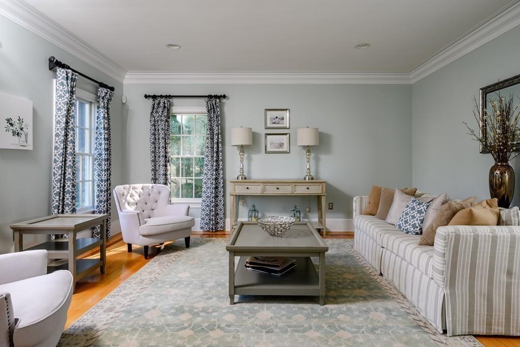 3 Lily Pond Lane Hingham, MA 02043 - Photo 18 of 42 a living room with furniture and a large window