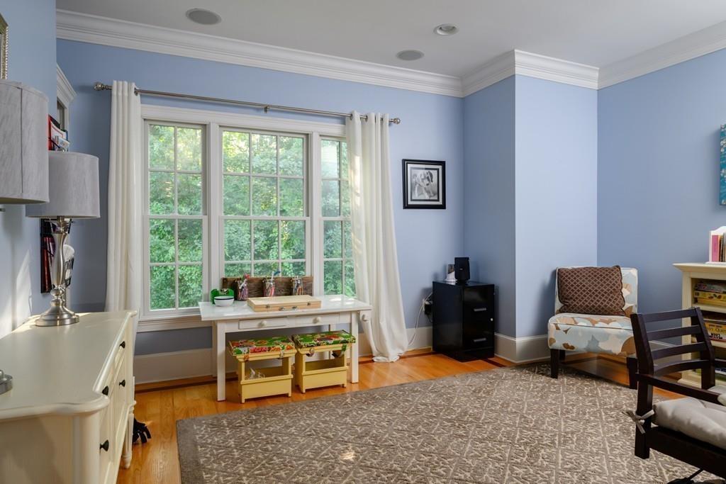 3 Lily Pond Lane Hingham, MA 02043 - Photo 20 of 42 a living room with furniture and a window