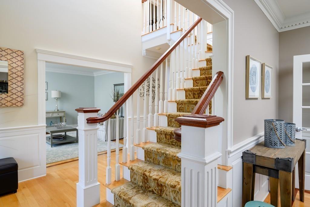 3 Lily Pond Lane Hingham, MA 02043 - Photo 21 of 42 a view of entryway and hall with wooden floor