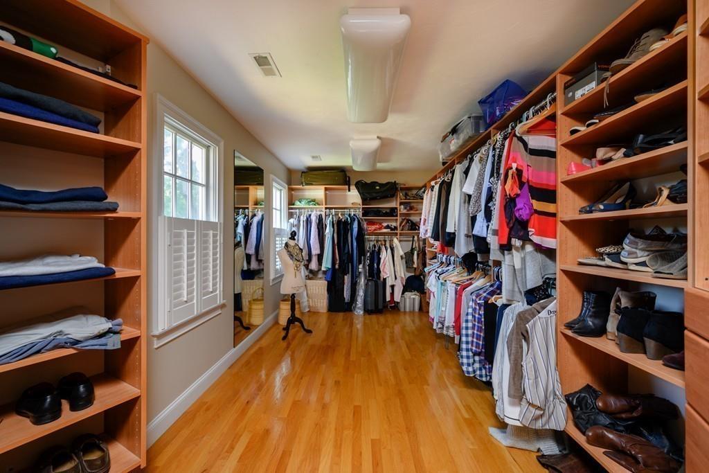 3 Lily Pond Lane Hingham, MA 02043 - Photo 28 of 42 a view of walk in closet with clothes and shoes