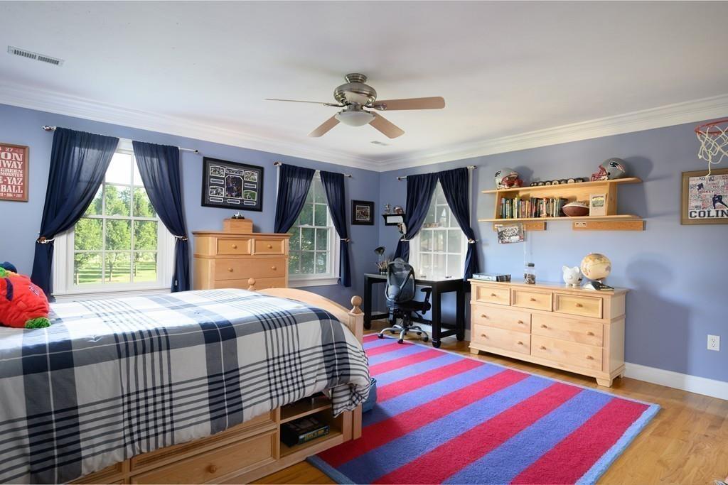 3 Lily Pond Lane Hingham, MA 02043 - Photo 35 of 42 a bedroom with a bed and a dresser
