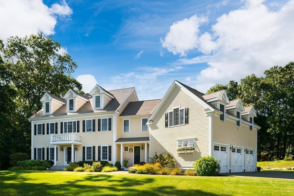 3 Lily Pond Lane Hingham, MA 02043 - Photo 38 of 42 a view of a white house with a big yard and potted plants in front of it