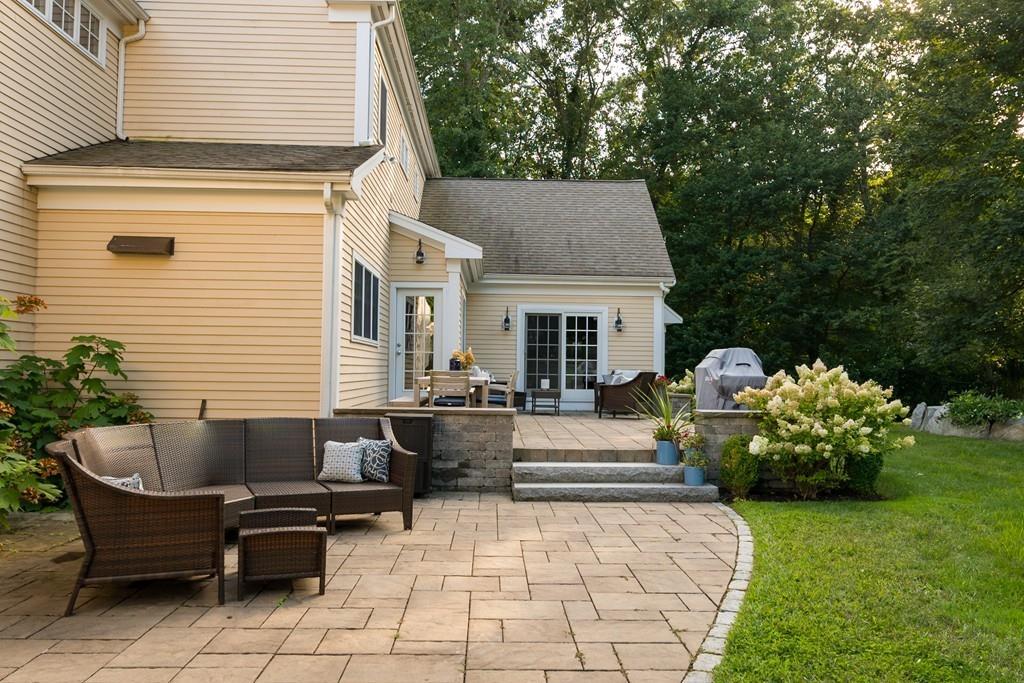 3 Lily Pond Lane Hingham, MA 02043 - Photo 40 of 42 a view of a house with backyard and sitting area