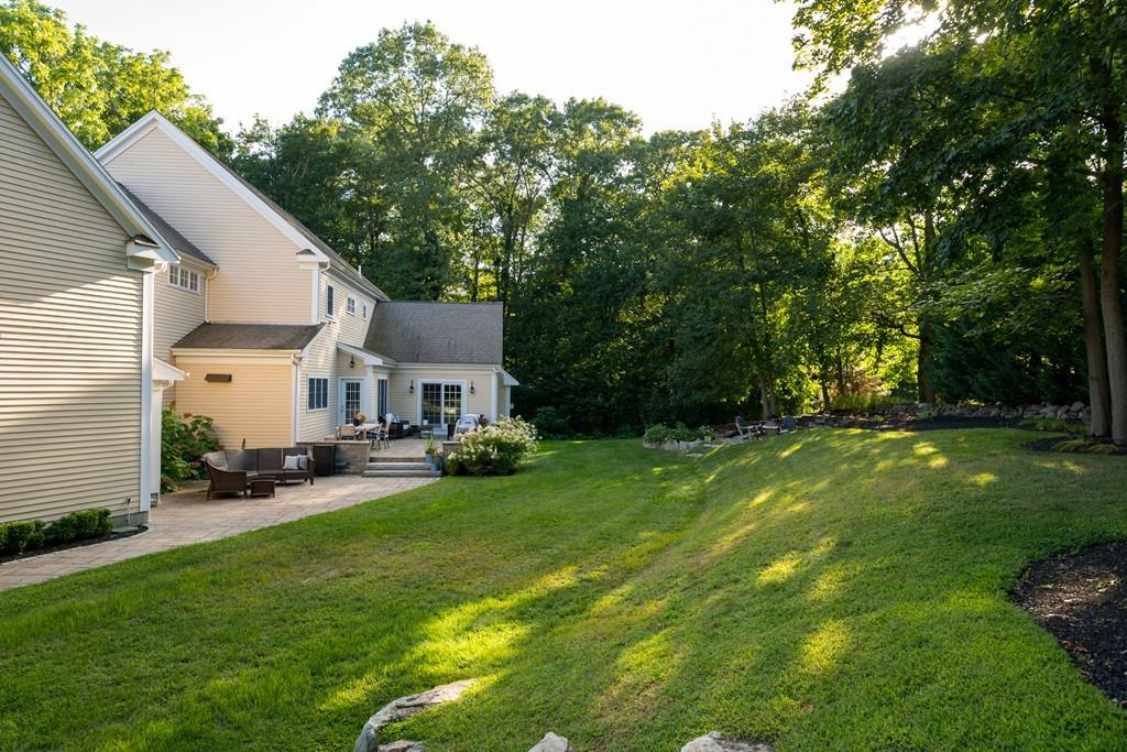 3 Lily Pond Lane Hingham, MA 02043 - Photo 41 of 42 a view of a house with backyard and sitting area