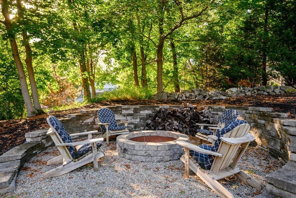 3 Lily Pond Lane Hingham, MA 02043 - Photo 42 of 42 a view of a backyard with plants and outdoor seating