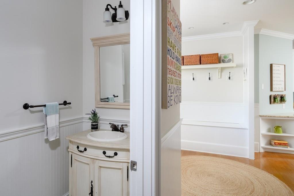 3 Lily Pond Lane Hingham, MA 02043 - Photo 5 of 42 a bathroom with a bathtub sink and mirror