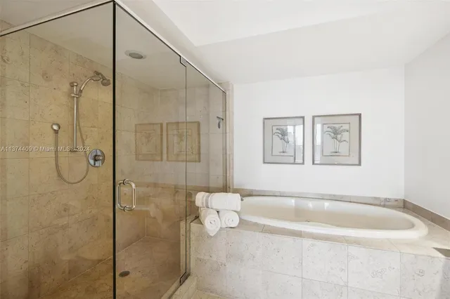 a view of a balcony with chair and table