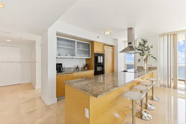 a view interior of a kitchen and natural light