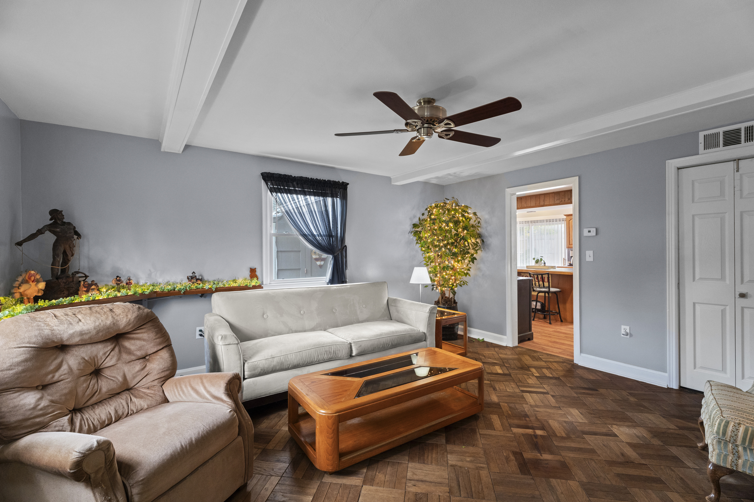 101 Pool Road North Haven, CT 06473 - Photo 11 of 23 a living room with furniture and a chandelier