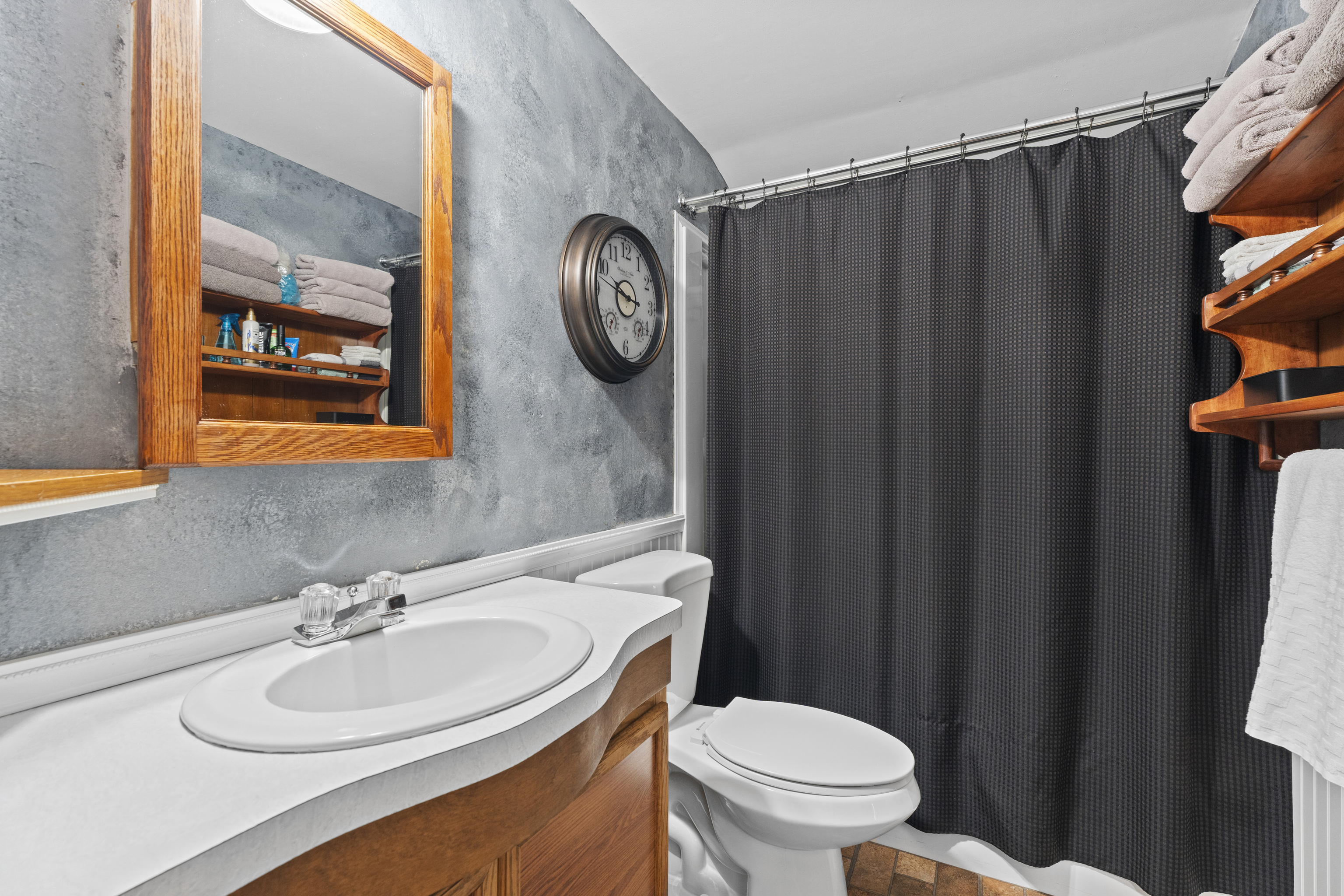 101 Pool Road North Haven, CT 06473 - Photo 19 of 23 a bathroom with a sink a toilet and a mirror