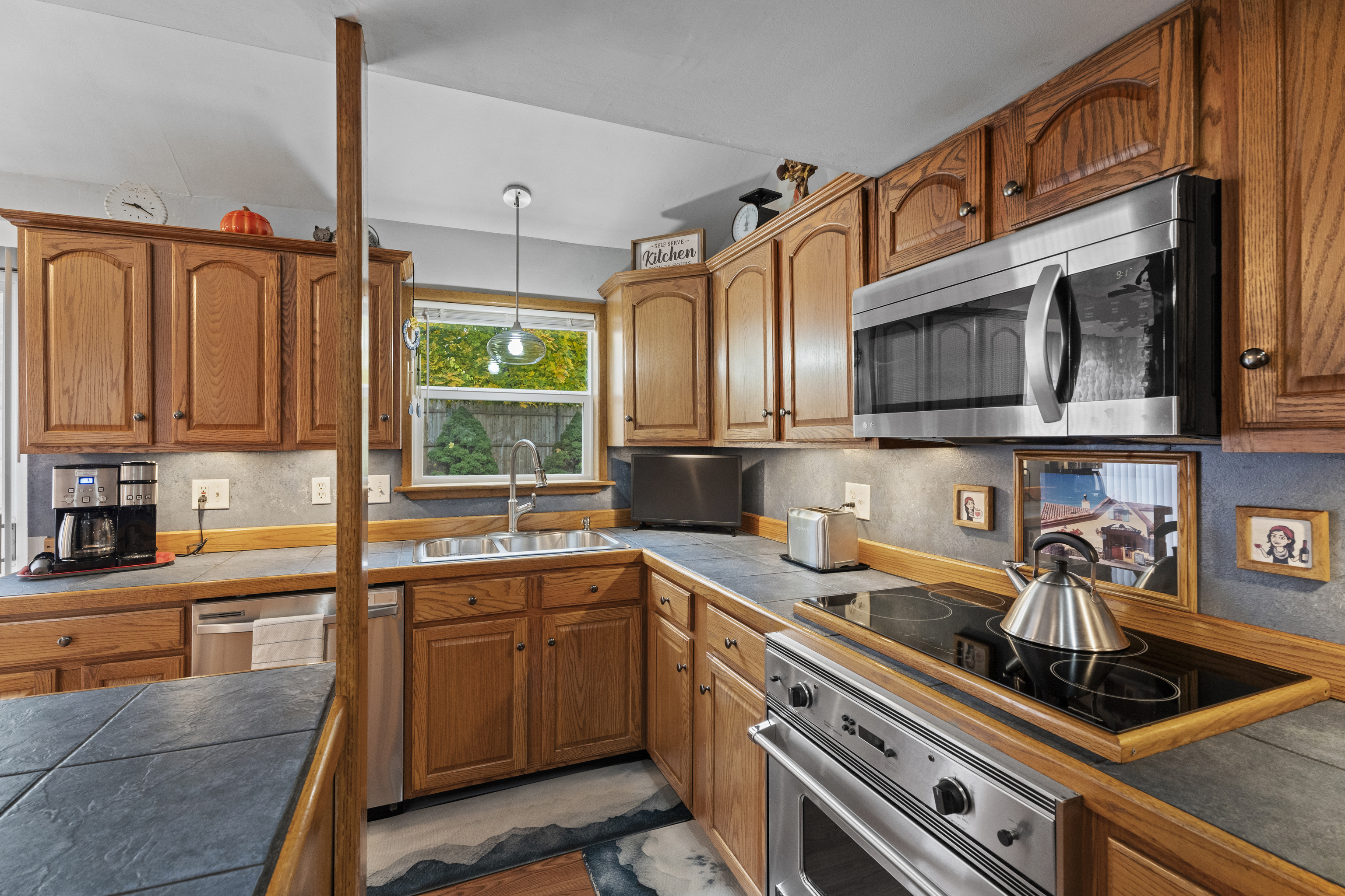 101 Pool Road North Haven, CT 06473 - Photo 3 of 23 a kitchen with stainless steel appliances a sink a stove and cabinets