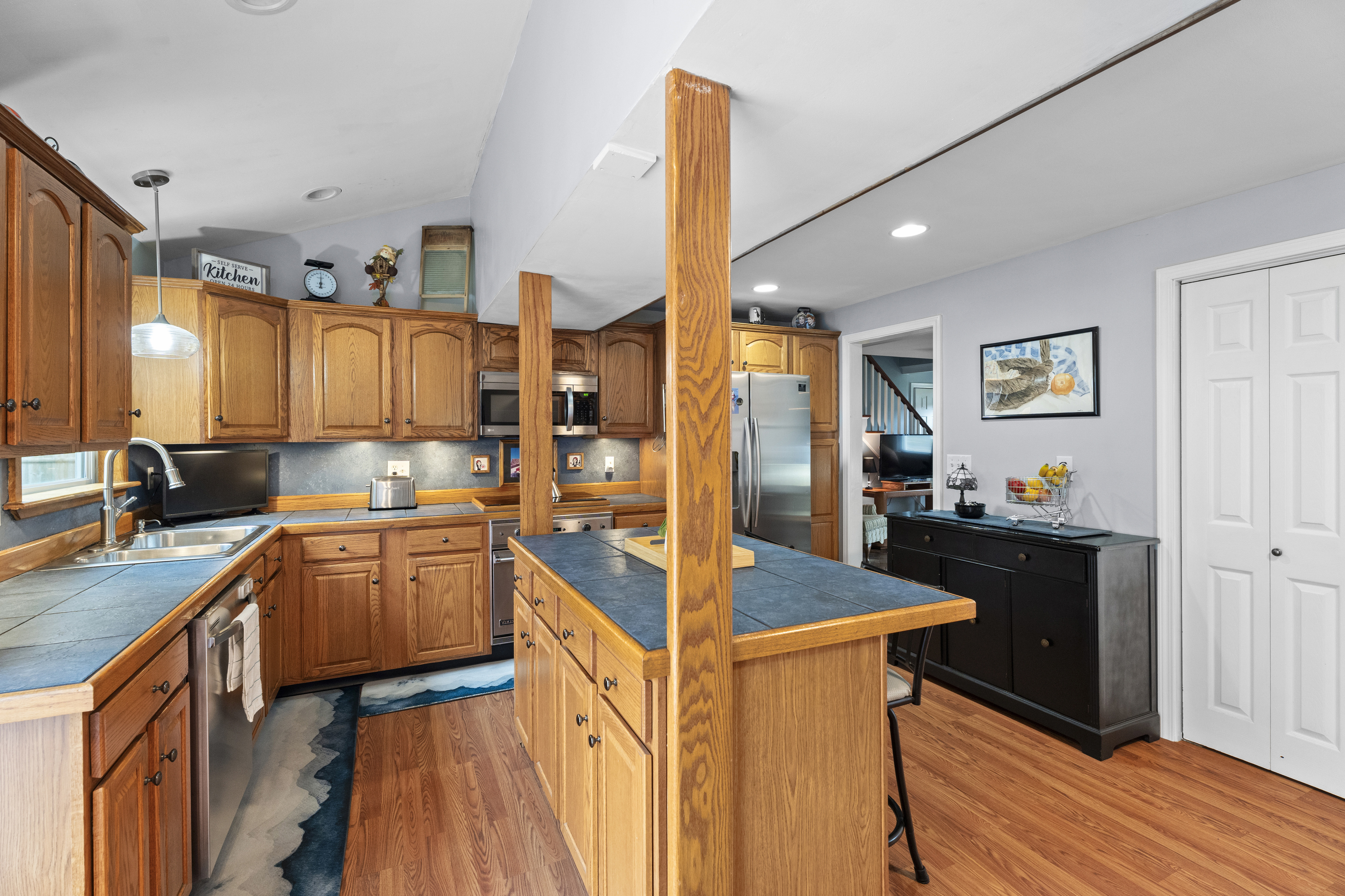 101 Pool Road North Haven, CT 06473 - Photo 5 of 23 a kitchen with stainless steel appliances granite countertop sink stove and refrigerator