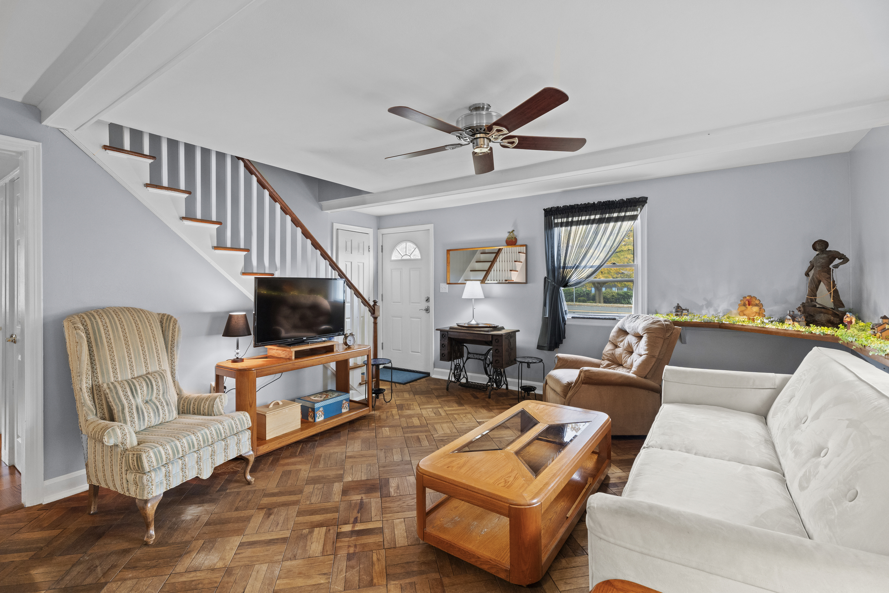 101 Pool Road North Haven, CT 06473 - Photo 9 of 23 a living room with furniture and a flat screen tv