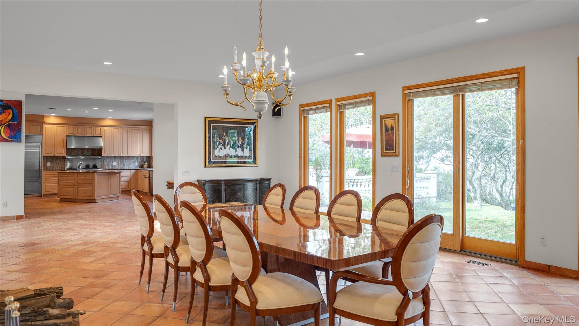 3400 Dignans Road Cutchogue, NY 11935 - Photo 12 of 34 Dining area featuring recessed lighting, light tile patterned floors, and a chandelier