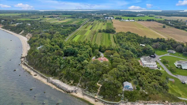 an aerial view of valley and lake