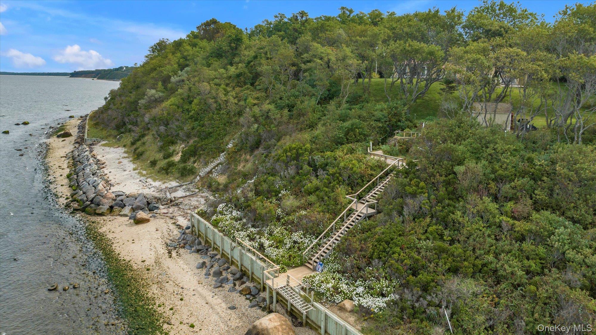 3400 Dignans Road Cutchogue, NY 11935 - Photo 26 of 34 Aerial view of property and surrounding area featuring a large body of water