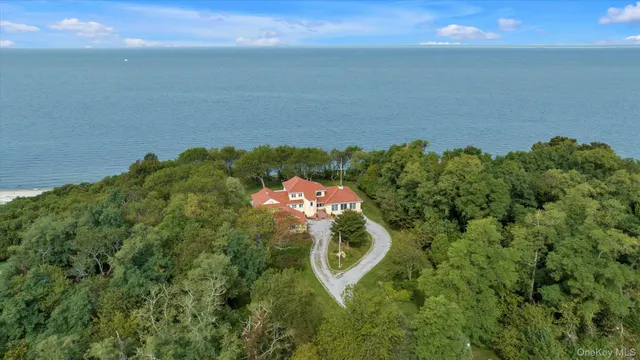 an aerial view of a house with a garden