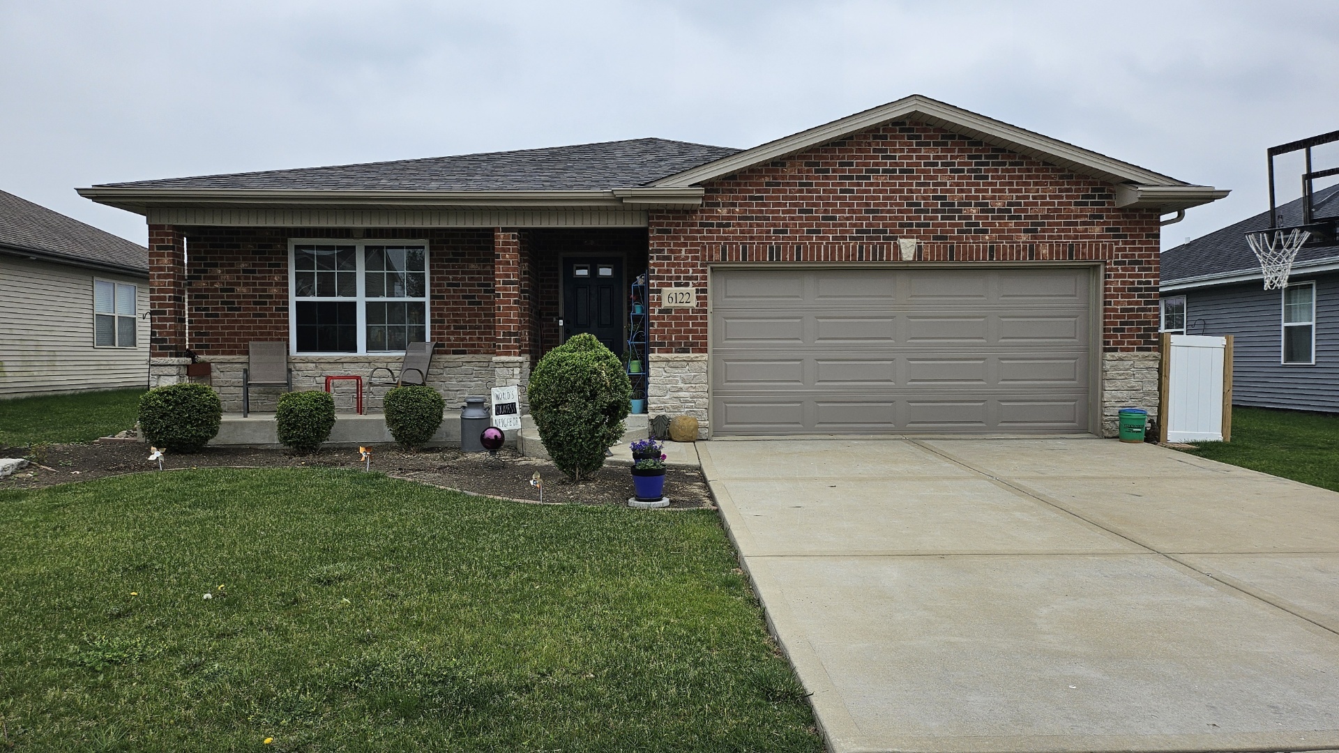 front view of a house with a yard