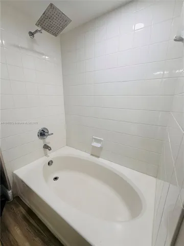 a bathroom with a bathtub