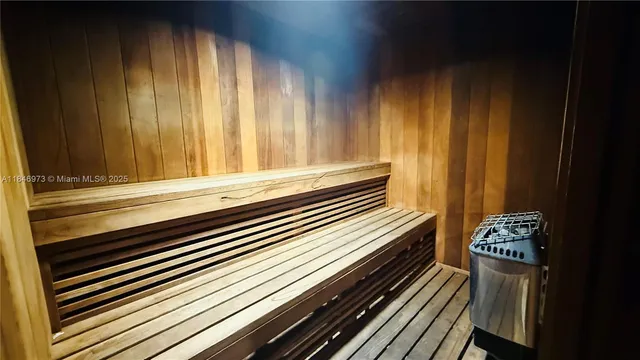 a view of room with wooden floor