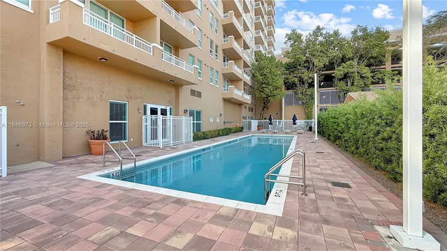 a view of a house with swimming pool